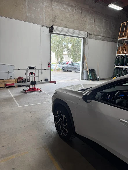 Vehicle in the Majesty Auto Glass shop for windshield service