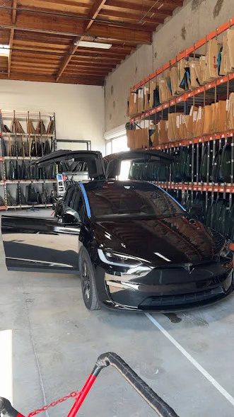 Tesla Model X being serviced at Majesty Auto Glass